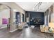 Stylish living room with neutral tones, designer furniture, and ample natural light at 2423 W Bramble Berry Ln, Phoenix, AZ 85085