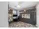 Bright office with lots of storage cabinets, a modern chandelier, a comfortable work space, and natural light at 2423 W Bramble Berry Ln, Phoenix, AZ 85085