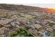 Aerial view of the home's exterior elevation showing the neighborhood and mountain views at 3211 E Ian Dr, Phoenix, AZ 85042