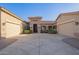 Inviting home with lush landscaping, tile roof, and a grand entrance at 3211 E Ian Dr, Phoenix, AZ 85042
