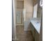 Bright bathroom featuring a shower with glass doors, a bathtub, and a single sink vanity at 3517 N Paseo Del Sol --, Mesa, AZ 85207