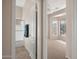 Bedroom with large windows, ceiling fan, carpet floors, and an attached bathroom at 3517 N Paseo Del Sol --, Mesa, AZ 85207