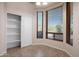 Bright office space with natural light, built-in shelves, and views of the desert landscape at 3517 N Paseo Del Sol --, Mesa, AZ 85207