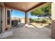Covered patio with a view of the backyard landscaping and golf course at 3517 N Paseo Del Sol --, Mesa, AZ 85207