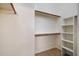 Spacious walk-in closet with shelving and hanging rods for ample storage at 3517 N Paseo Del Sol --, Mesa, AZ 85207