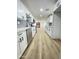 Spacious kitchen featuring white cabinetry and stainless steel appliances at 3807 N 64Th Dr, Phoenix, AZ 85033