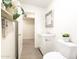 Bathroom showcasing a vanity sink, decorative mirror, and modern fixtures at 4145 E Libby St, Phoenix, AZ 85032