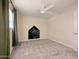 Cozy bedroom featuring a built-in chalkboard wall and a ceiling fan at 4145 E Libby St, Phoenix, AZ 85032