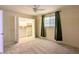 Bright bedroom featuring a closet organizer system and brick accent wall at 4145 E Libby St, Phoenix, AZ 85032