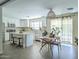 Bright and airy kitchen with an adjacent dining area, perfect for entertaining at 4145 E Libby St, Phoenix, AZ 85032