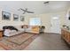 Inviting living room with a large sectional sofa and stylish area rug at 4145 E Libby St, Phoenix, AZ 85032