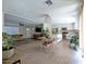 Open-concept living space combining kitchen, dining, and living areas for seamless flow at 4145 E Libby St, Phoenix, AZ 85032