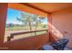 Balcony with seating, overlooking a golf course and distant mountains at 4303 E Cactus Rd # 326, Phoenix, AZ 85032