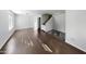 Open and airy living area with hardwood floors and lots of natural light at 4552 S 238Th Ln, Buckeye, AZ 85326