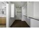 Spacious walk-in closet featuring built-in shelving and ample storage space at 4552 S 238Th Ln, Buckeye, AZ 85326