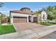 Stunning home showcasing a three-car garage, tile roof, and a brick paver driveway at 4639 N 29Th St, Phoenix, AZ 85016