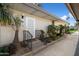 Inviting front entrance with decorative door, steps, and lush landscaping at 4800 N 68Th St # 263, Scottsdale, AZ 85251