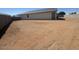 Large backyard area with block fencing, ready for your personal touch at 481 N 17Th St, Coolidge, AZ 85128