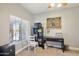 Bright home office space with a desk, storage, and natural light at 4979 E Colonial Dr, Chandler, AZ 85249
