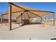 Community playground featuring swings, slides, and a shaded picnic area at 4979 E Colonial Dr, Chandler, AZ 85249
