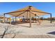 Community playground featuring swings, slides, and a shaded picnic area at 4979 E Colonial Dr, Chandler, AZ 85249