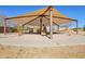 Community playground featuring swings, slides, and a shaded picnic area at 4979 E Colonial Dr, Chandler, AZ 85249