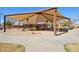 Community playground featuring swings, slides, and a shaded picnic area at 4979 E Colonial Dr, Chandler, AZ 85249