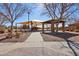 Community playground featuring a shaded structure, play equipment and walking path at 4979 E Colonial Dr, Chandler, AZ 85249