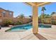 Inviting pool with mature landscaping creating a private backyard oasis for relaxation and entertainment at 4979 E Colonial Dr, Chandler, AZ 85249