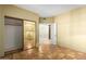 Neutral bedroom has large closet and ceramic tile flooring that connects to other rooms at 5200 S Lakeshore Dr # 106, Tempe, AZ 85283