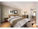 Comfortable bedroom featuring neutral tones, stylish furnishings, and artwork to create a relaxing atmosphere at 5200 S Lakeshore Dr # 106, Tempe, AZ 85283