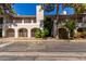 Multi-level condo building showcasing architectural design, balconies, and well-maintained landscaping at 5200 S Lakeshore Dr # 106, Tempe, AZ 85283