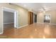 Expansive living room with beautiful wood floors and an open layout, perfect for entertaining at 5200 S Lakeshore Dr # 106, Tempe, AZ 85283