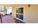 Covered patio featuring neutral color scheme, flagstone flooring and sliding glass door at 6408 W Prickly Pear Trl, Phoenix, AZ 85083