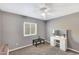 Calm bedroom featuring carpet, a fan, and a vanity table at 6408 W Prickly Pear Trl, Phoenix, AZ 85083