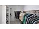 Walk-in closet includes rods and shelving for optimal storage capacity at 6408 W Prickly Pear Trl, Phoenix, AZ 85083
