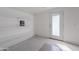 The bonus room has white shelving and a door leading to the exterior at 650 N Hawes Rd # 2873, Mesa, AZ 85207