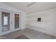 The bonus room has white shelving and a door leading to the exterior at 650 N Hawes Rd # 2873, Mesa, AZ 85207