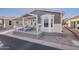 A delightful home with a bay window and fenced front patio, perfect for curb appeal at 650 N Hawes Rd # 2873, Mesa, AZ 85207