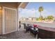 Inviting outdoor seating on a covered porch, ideal for relaxing and enjoying neighborhood views at 650 N Hawes Rd # 2873, Mesa, AZ 85207