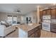Open-concept living room and kitchen perfect for entertaining and Gathering gatherings at 650 N Hawes Rd # 2873, Mesa, AZ 85207