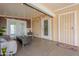 Relaxing sunroom with stylish decor and easy access to the outdoors, offering serene views at 650 N Hawes Rd # 2873, Mesa, AZ 85207