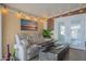 Comfortable sunroom featuring a plush sofa and ample light, perfect for relaxation at 650 N Hawes Rd # 2873, Mesa, AZ 85207