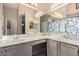 Bathroom featuring double sinks, and a large mirror at 6551 E Quartz St, Mesa, AZ 85215