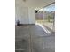 Open carport with an entrance to backyard through a metal gate at 6607 W Osborn Rd, Phoenix, AZ 85033