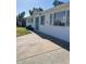 Charming one-story home featuring a blue entry door and grey shutters at 6607 W Osborn Rd, Phoenix, AZ 85033