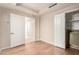 Spacious bedroom with hardwood floors, white doors and good natural light at 6803 E Main St # 3306, Scottsdale, AZ 85251