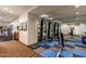 Well-equipped gym featuring weight machines, treadmills, and mirrored walls for a complete fitness experience at 6803 E Main St # 3306, Scottsdale, AZ 85251