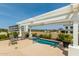 Rooftop plunge pool surrounded by lush landscaping and a pergola, offering a serene escape at 6803 E Main St # 3306, Scottsdale, AZ 85251