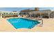 Inviting pool area with comfortable lounge chairs, pergolas, and barbecue facilities for outdoor enjoyment at 6803 E Main St # 3306, Scottsdale, AZ 85251